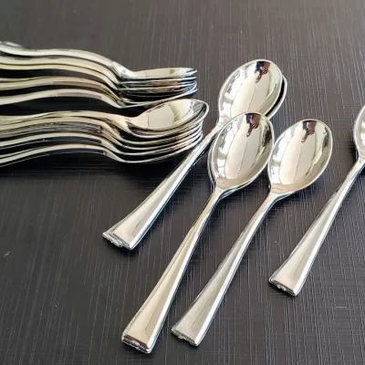 CUCHARITAS PLASTICAS PLATA X24U.